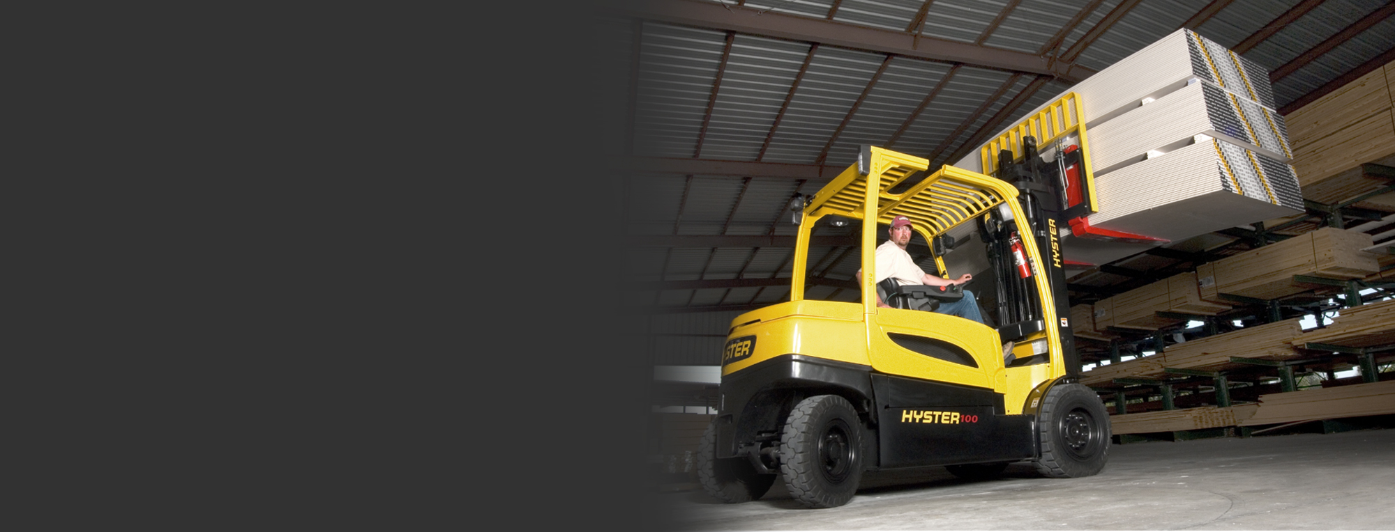 LP_Hyster-Header-2 Yellow Hyster forklift lifting wood