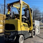 Hyster S50FT forklift with carton clamp attachment