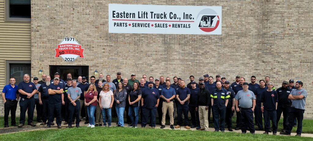 Group photo outside Eastern Lift Truck Co.'s facility in Newark, DE.