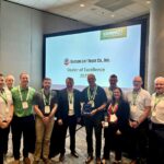 Combilift presents Eastern Lift Truck Co. with its 2025 Dealer of Excellence Award.