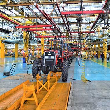 Assembly line at tractor manufacturing plant.